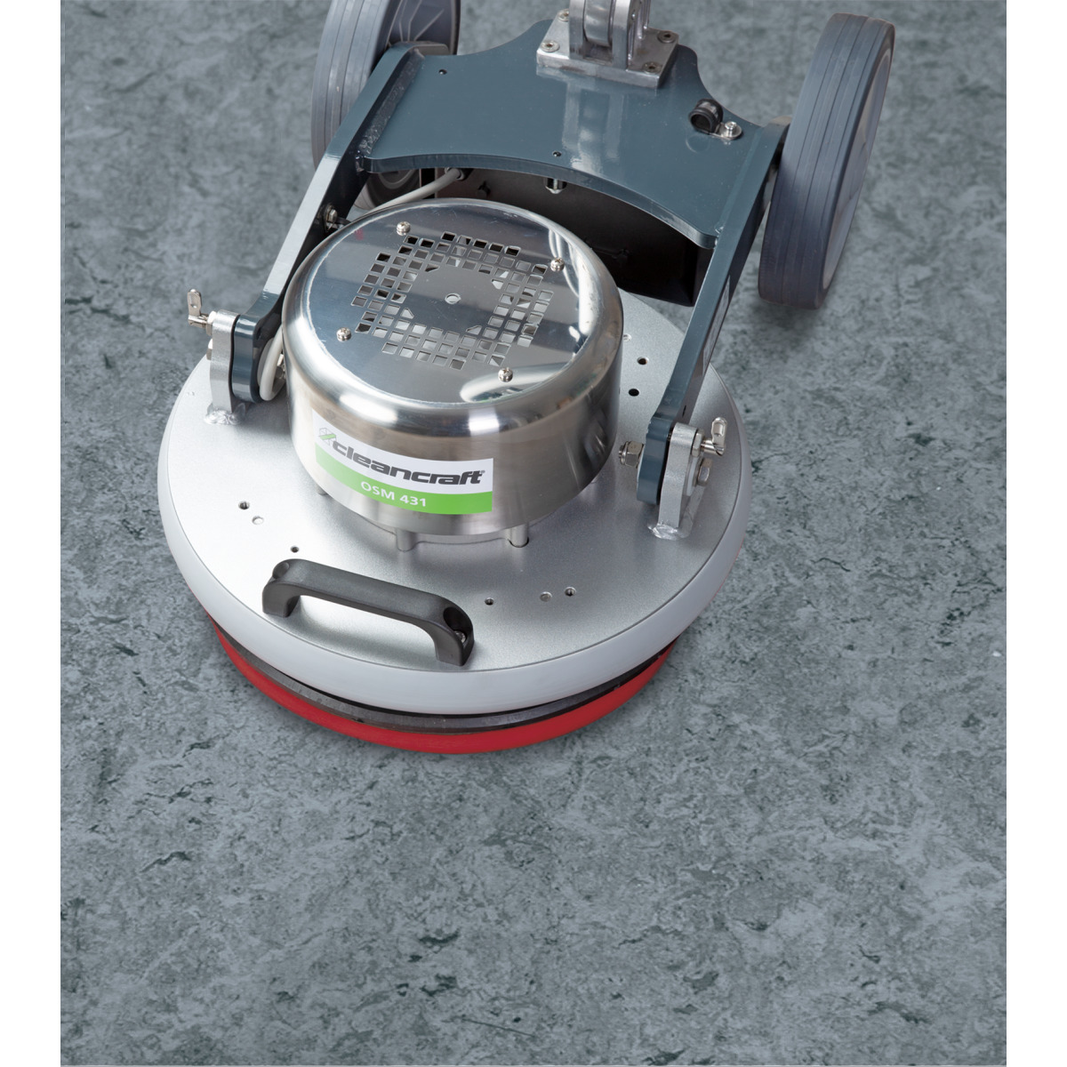 Orbital-Einscheibenmaschine OSM 431 Bodenreinigungsmaschine reinigt glatten grauen Boden mit roter Bürste, gleichmäßiger Reinigungskreis.