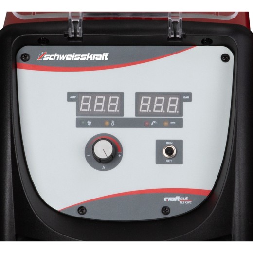 Bedienfeld eines Plasma-Schneidgeräts mit Drehknopf, Kippschalter und Kontrollleuchten unter einem transparenten Deckel.